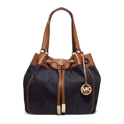 michael kors denim item extra large tote|Michael Kors Tote with zipper.